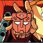 an icon of rodimus' hand holding an autobot badge